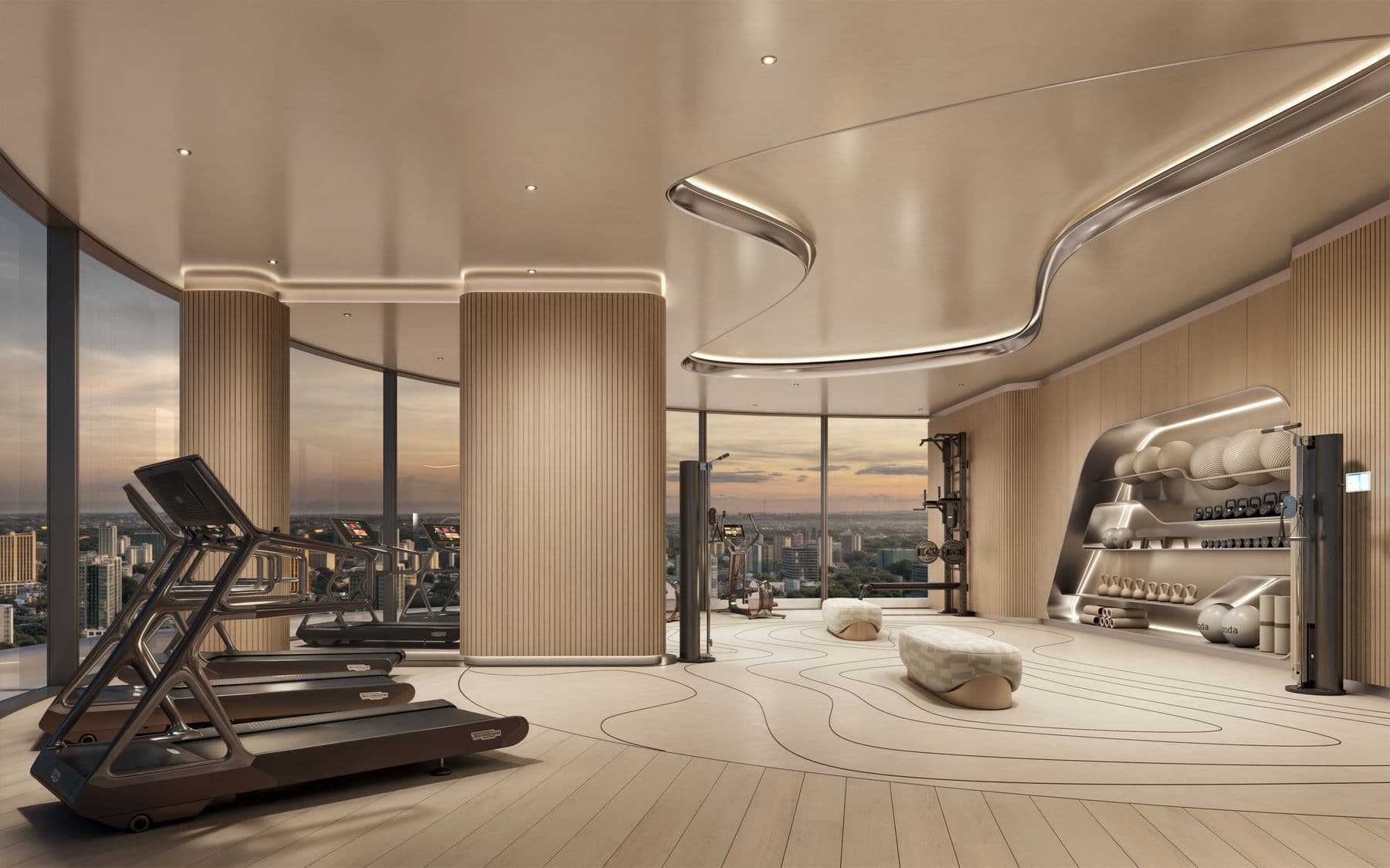 The gym, with city views through the glass