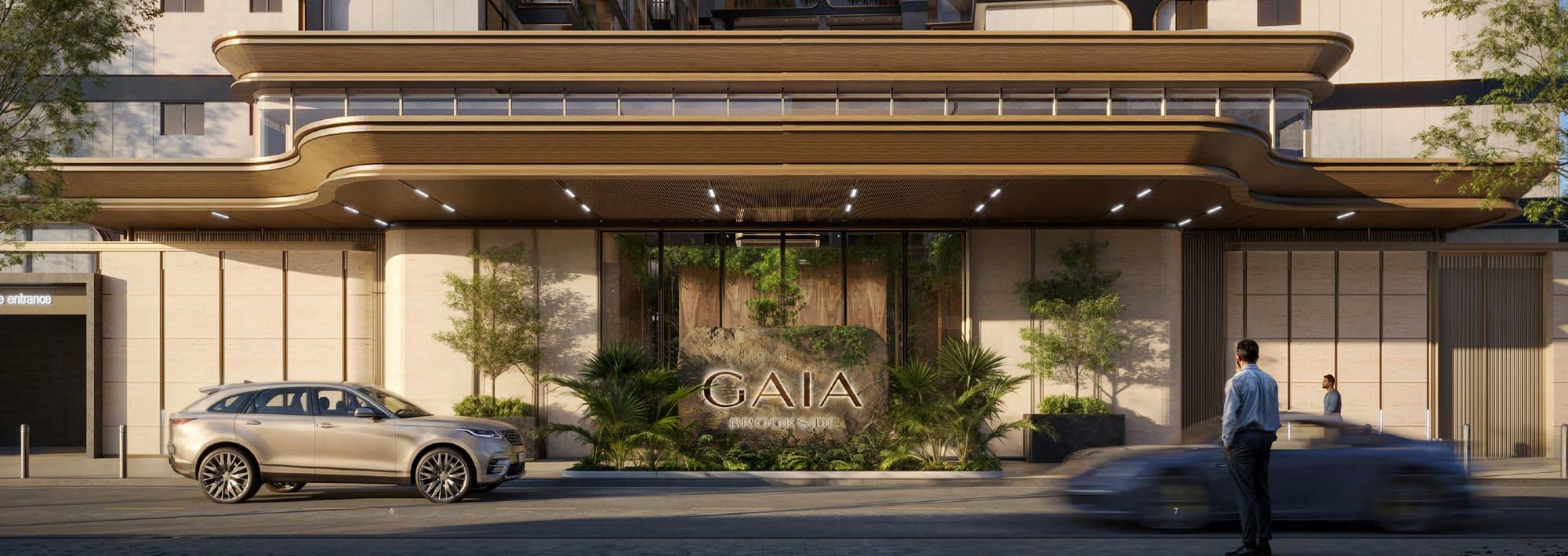 The Gaia Brookside entrance on Brookside Drive, with its stone sign and planted canopy